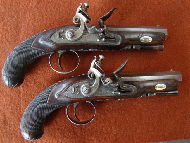 A FABULOUS PAIR of Flintlock travelling pistols made by H W MORTIMER, GUN MAKER TO HIS MAJESTY, circa 1782-1790.